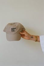 Load image into Gallery viewer, Khaki Baseball Cap embroidered with &quot;Handle With Care&quot;
